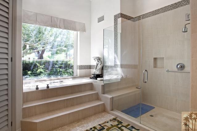 37232 Palm View Road Rancho Mirage, CA 92270 - Photo 19 of 25 a bathroom with a tub and a shower