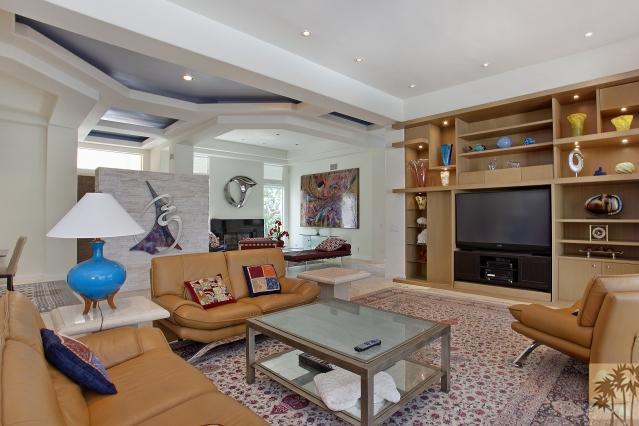 37232 Palm View Road Rancho Mirage, CA 92270 - Photo 10 of 25 a living room with furniture and a flat screen tv