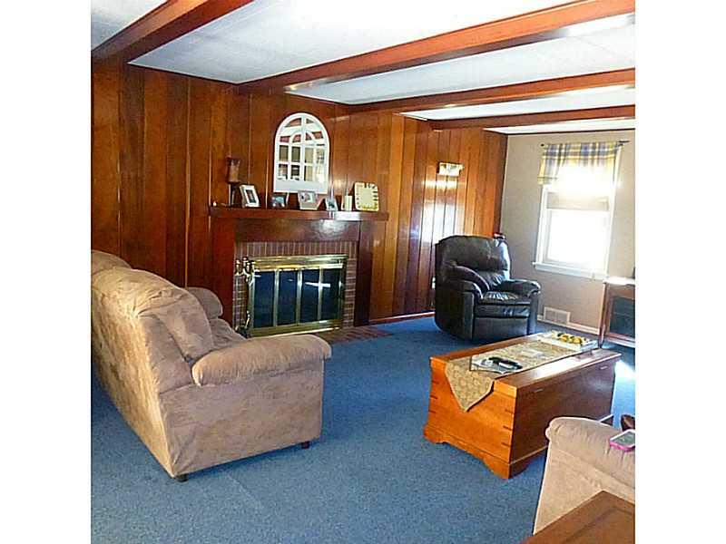 216 Tech Road Thornburg, PA 15205 - Photo 12 of 24 Family Room. Large family room with wood burning fireplace