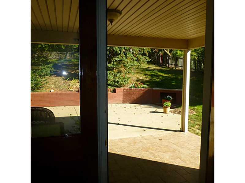 216 Tech Road Thornburg, PA 15205 - Photo 14 of 24 Patio/Deck. View from family room to covered porch and patio