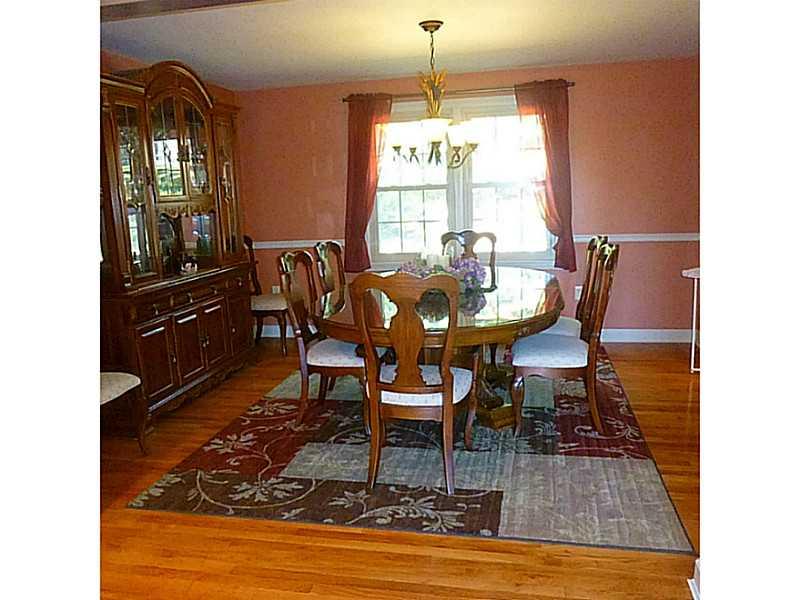 216 Tech Road Thornburg, PA 15205 - Photo 7 of 24 Dining Room. Hardwood floors with view of backyard