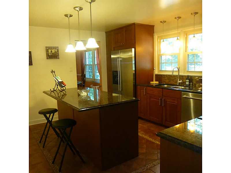 216 Tech Road Thornburg, PA 15205 - Photo 9 of 24 Kitchen. Fresh and New with Craftsman style cabinetry and granite counters and large island for storage, prep work and dining