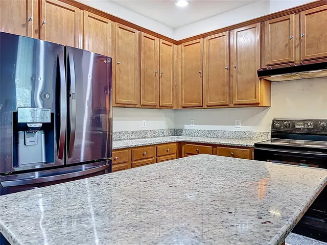 a bedroom with a bed and a furniture