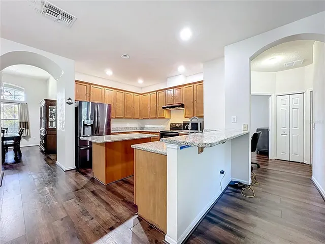 a bathroom with a bathtub a sink and a mirror