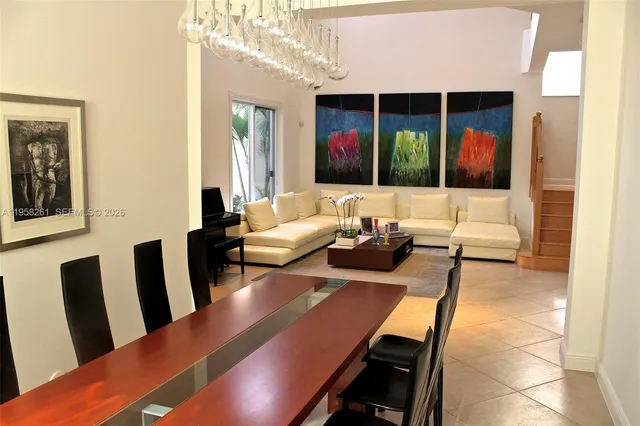 a living room with furniture and window