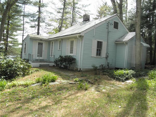 26 Old Acres Road Holland, MA 01521 - Photo 1 of 15 a backyard of a house