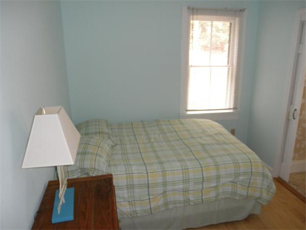 26 Old Acres Road Holland, MA 01521 - Photo 5 of 15 a bed sitting in a bedroom next to a window