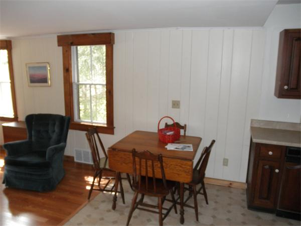 26 Old Acres Road Holland, MA 01521 - Photo 6 of 15 a view of a dining room with furniture and a window