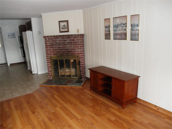 26 Old Acres Road Holland, MA 01521 - Photo 7 of 15 a living room with furniture and a fireplace