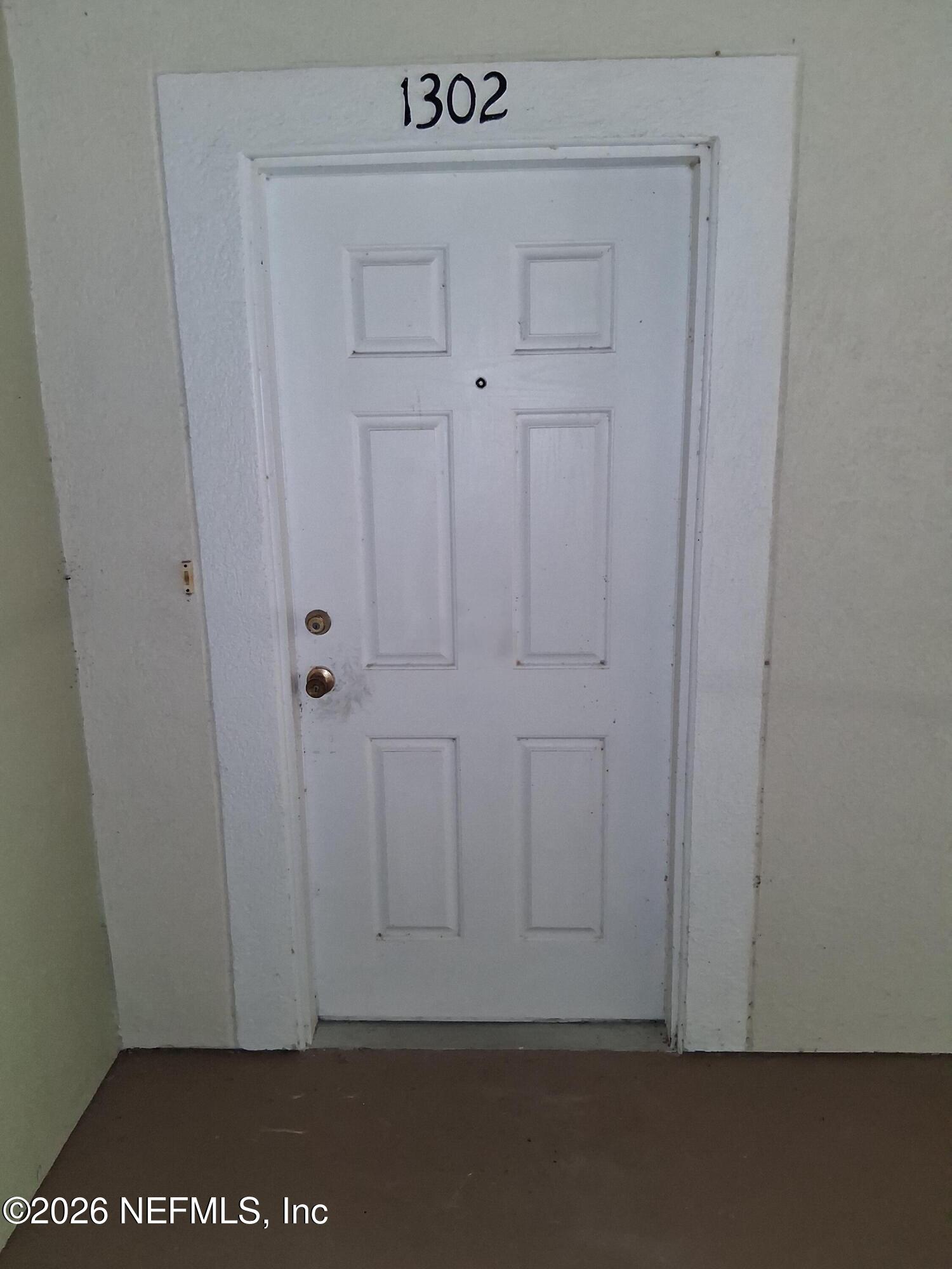 7920 Merrill Road, Unit 1302 Jacksonville, FL 32277 - Photo 8 of 17 Front Door