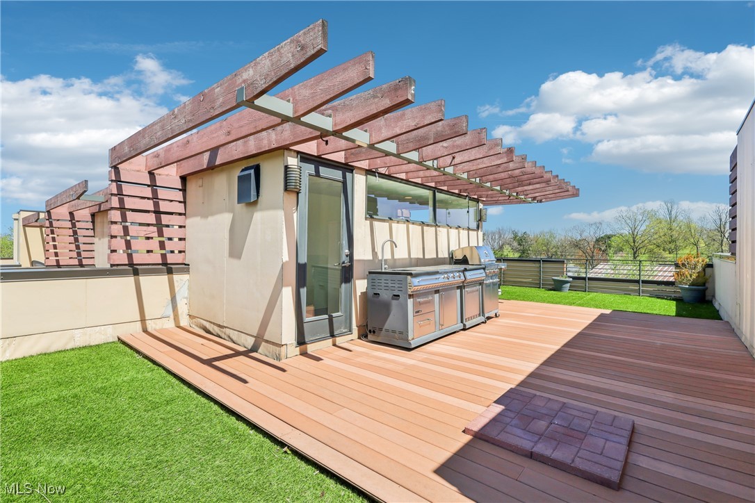 1852 Coltman Road Cleveland, OH 44106 - Photo 32 of 39 Roof top deck featuring pergola and outdoor kitchen.