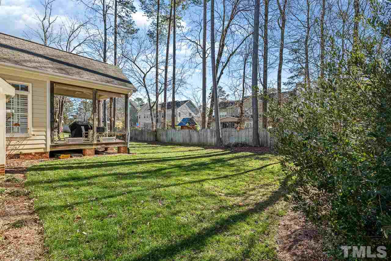 7913 Pine Timber Drive Raleigh, NC 27613 - Photo 24 of 25 a swimming pool with outdoor seating and yard