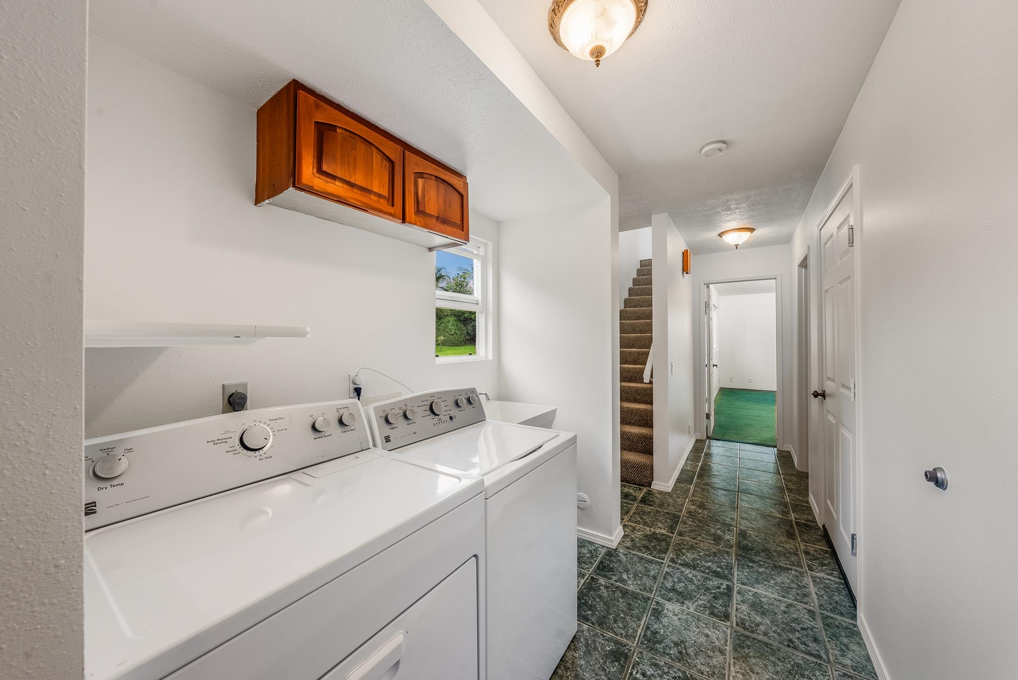 4535 Opana Place Haiku, HI 96708 - Photo 19 of 43 a bathroom with a sink a mirror and a shower