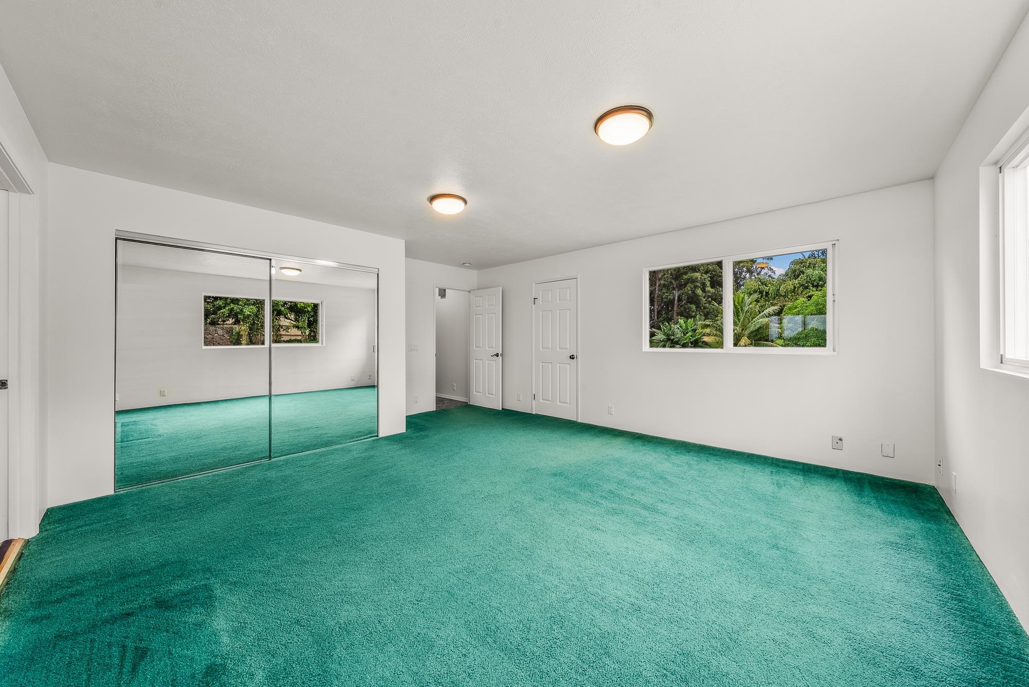 4535 Opana Place Haiku, HI 96708 - Photo 23 of 43 a view of a room with window and a ceiling fan