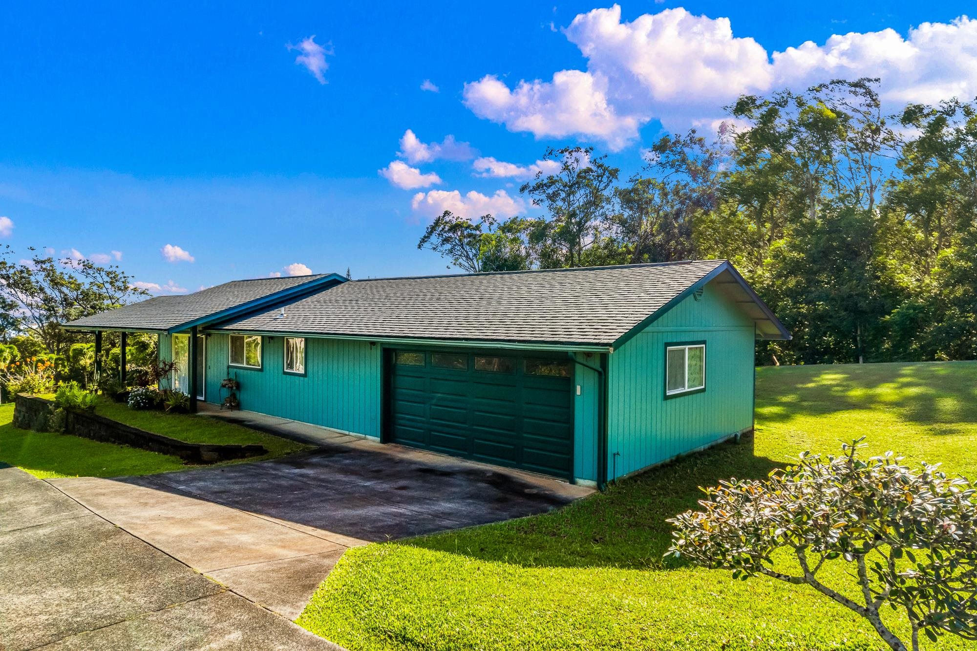 4535 Opana Place Haiku, HI 96708 - Photo 29 of 43 a view of a house with a yard