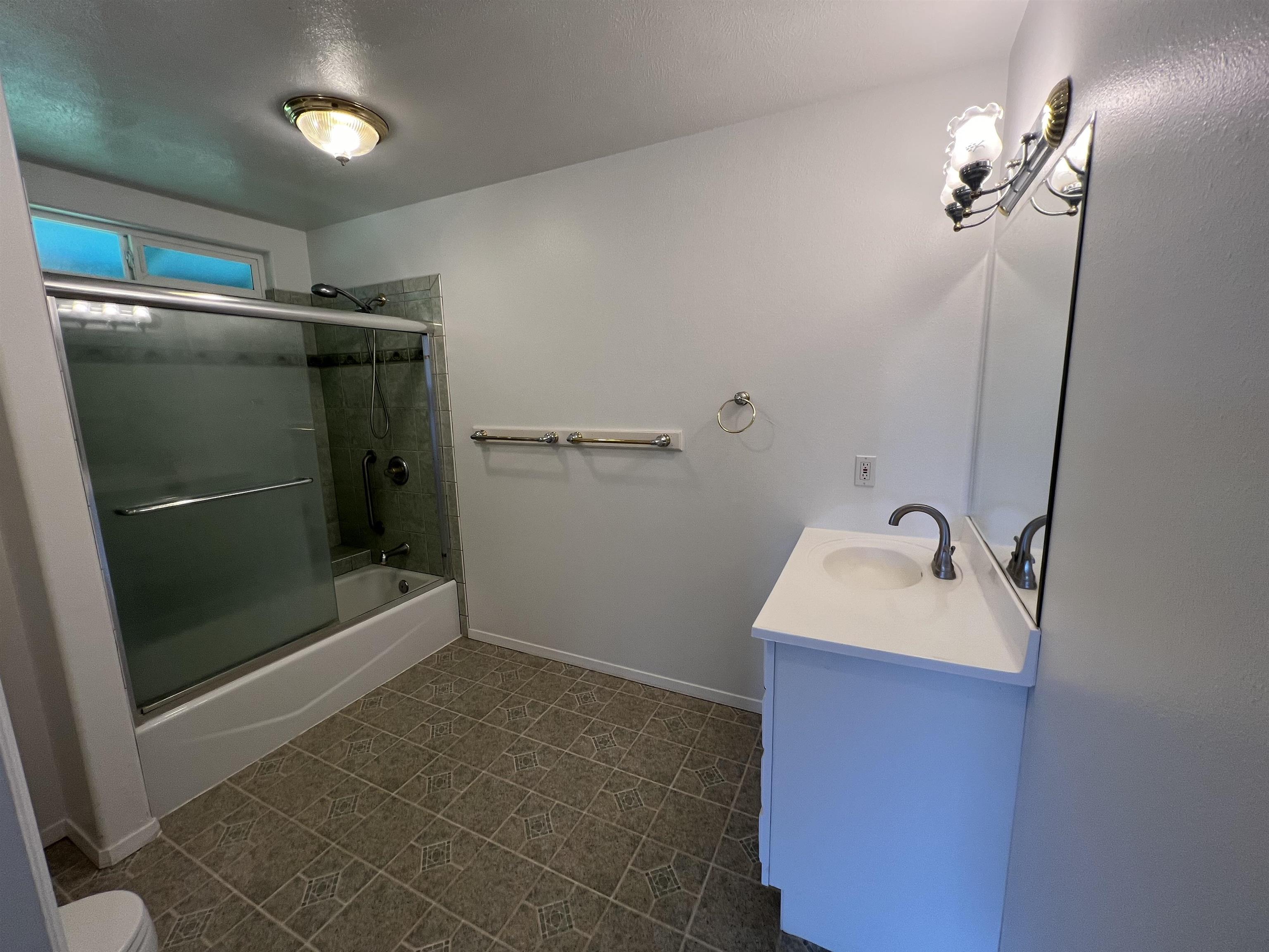 4535 Opana Place Haiku, HI 96708 - Photo 35 of 43 a bathroom with a sink and mirror