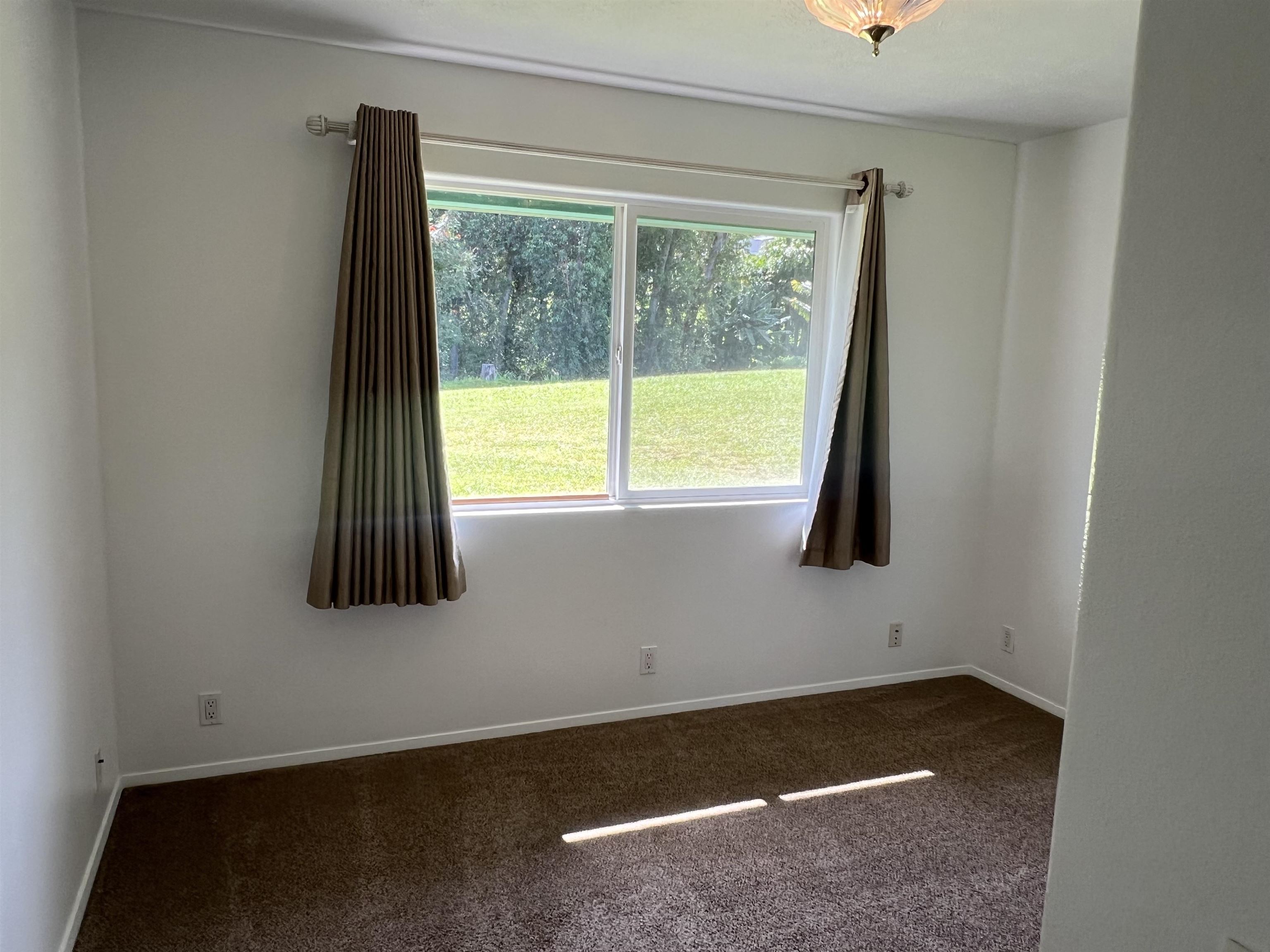 4535 Opana Place Haiku, HI 96708 - Photo 37 of 43 a view of a room with window