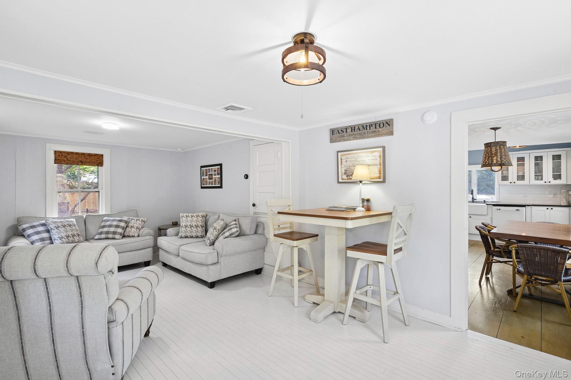 163 Three Mile Harbor Road East Hampton, NY 11937 - Photo 4 of 13 a living room with furniture and a window