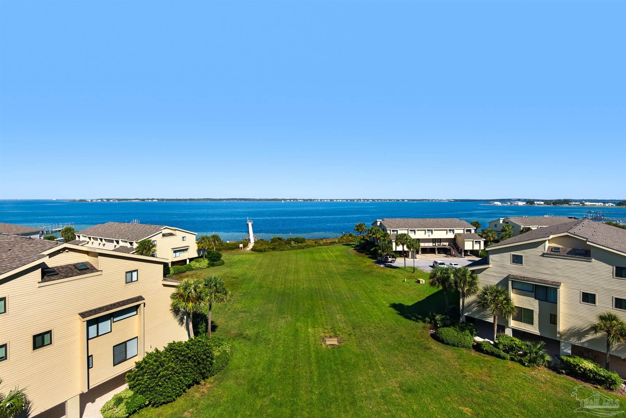 900 Fort Pickens Road, Unit 1053 Pensacola Beach, FL 32561 - Photo 53 of 57 an aerial view of a house with a garden