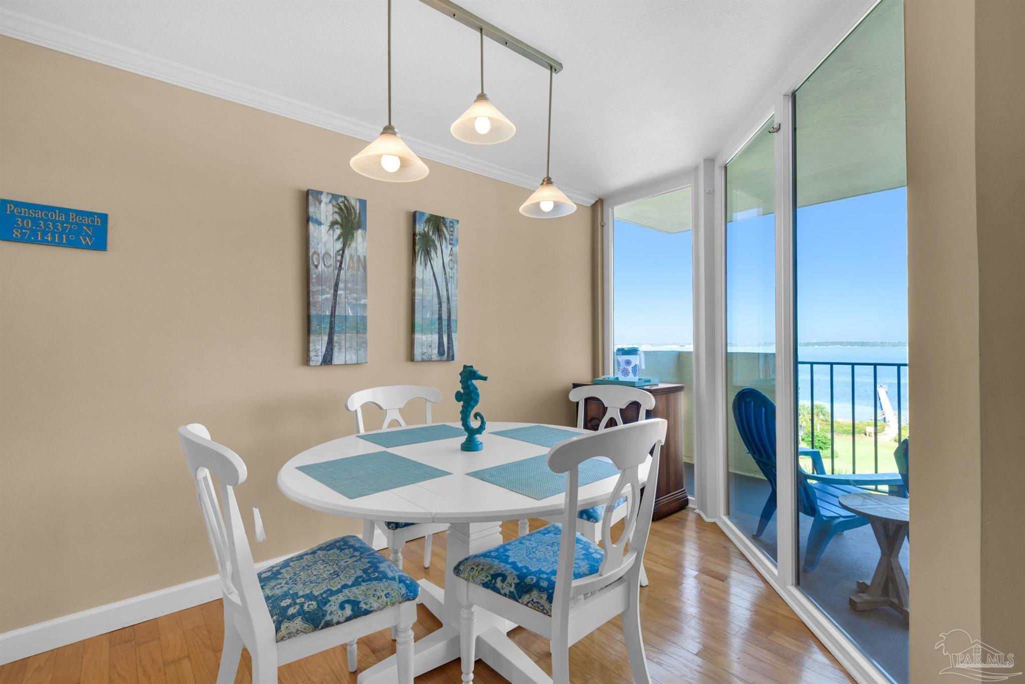 900 Fort Pickens Road, Unit 1053 Pensacola Beach, FL 32561 - Photo 8 of 57 a view of a a dining room with furniture window and outside view