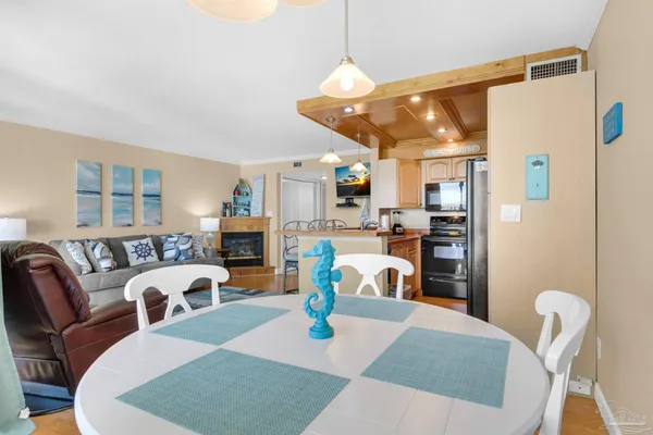 a kitchen that has a sink and a stove