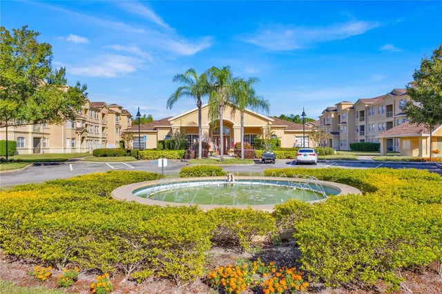 a view of an swimming pool and a yard