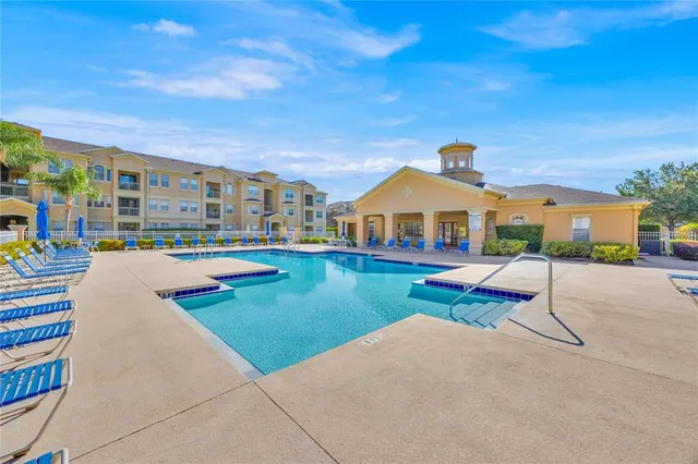 a view of a house with swimming pool