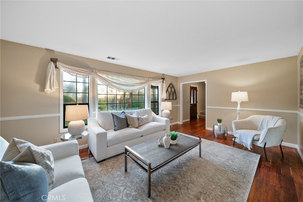 40440 Calle Torcida Temecula, CA 92591 - Photo 11 of 48 a living room with furniture and a large window