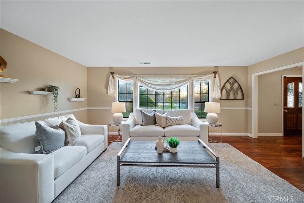 40440 Calle Torcida Temecula, CA 92591 - Photo 14 of 48 a living room with furniture and a large window