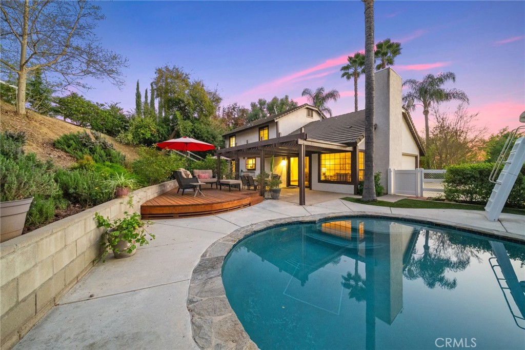 40440 Calle Torcida Temecula, CA 92591 - Photo 2 of 48 a view of a swimming pool with a patio