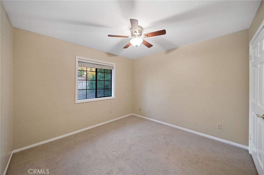 40440 Calle Torcida Temecula, CA 92591 - Photo 24 of 48 an empty room with windows and fan