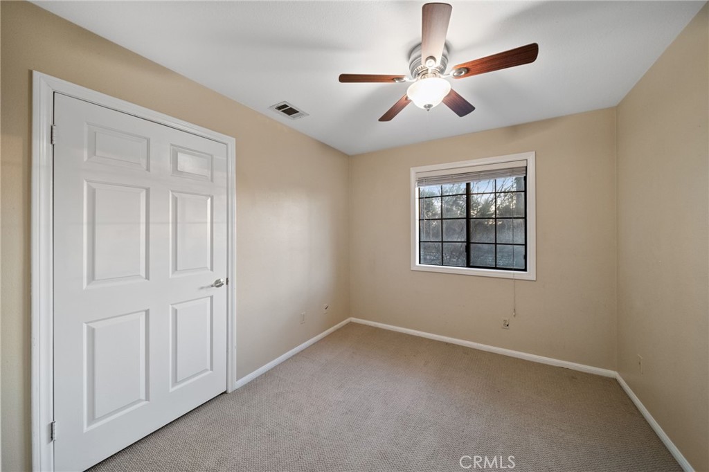 40440 Calle Torcida Temecula, CA 92591 - Photo 25 of 48 an empty room with windows and fan