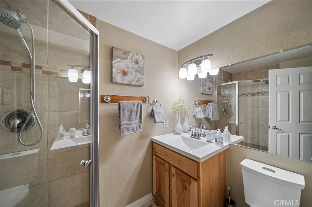 40440 Calle Torcida Temecula, CA 92591 - Photo 26 of 48 a bathroom with a sink a toilet and shower