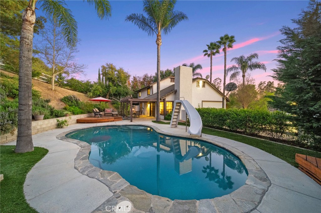 40440 Calle Torcida Temecula, CA 92591 - Photo 33 of 48 a view of a swimming pool with a patio