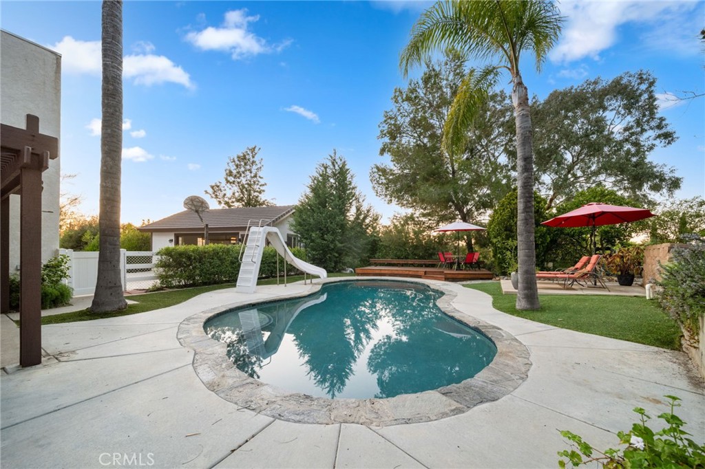 40440 Calle Torcida Temecula, CA 92591 - Photo 43 of 48 a view of a swimming pool with a patio