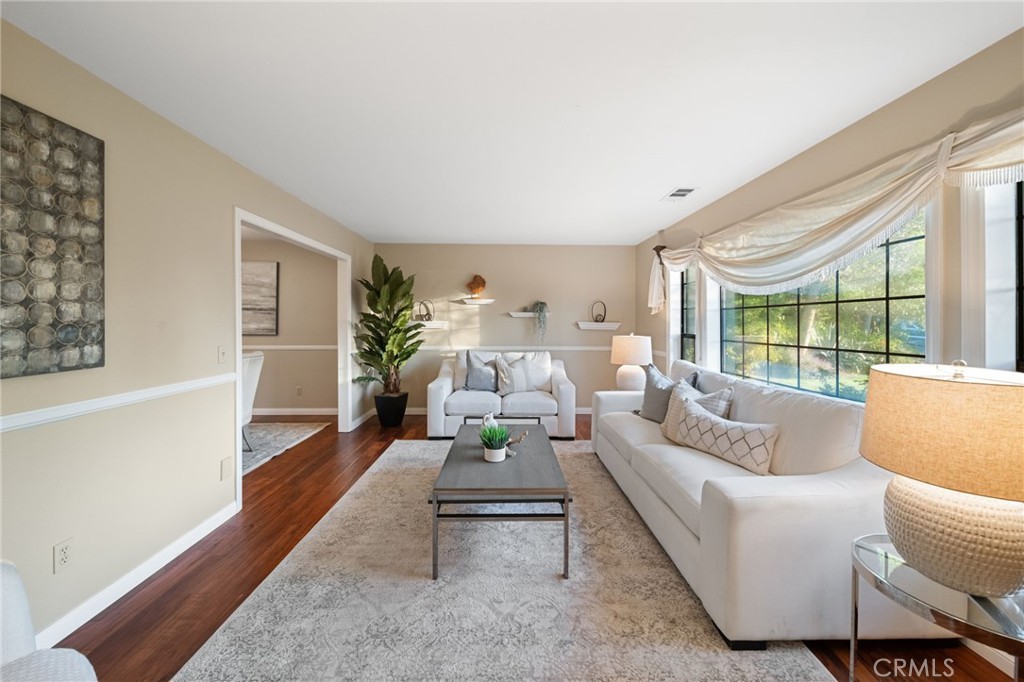 40440 Calle Torcida Temecula, CA 92591 - Photo 10 of 48 a living room with furniture large window and wooden floor