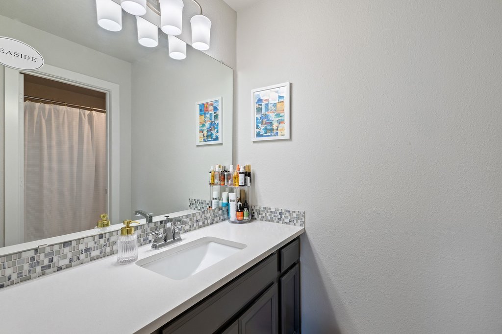741 Rawson Bend Austin, TX 78738 - Photo 29 of 40 The other private vanity area for the other bedroom connected to the shared bath.