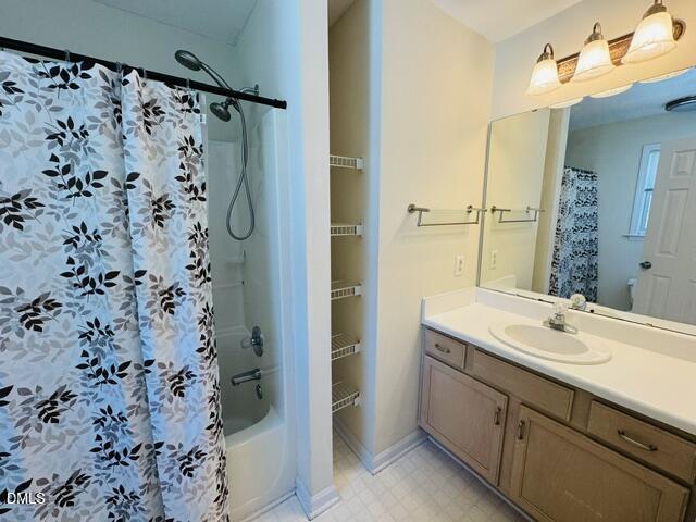 2027 Turtle Point Drive Raleigh, NC 27604 - Photo 17 of 18 a bathroom with a sink and a mirror