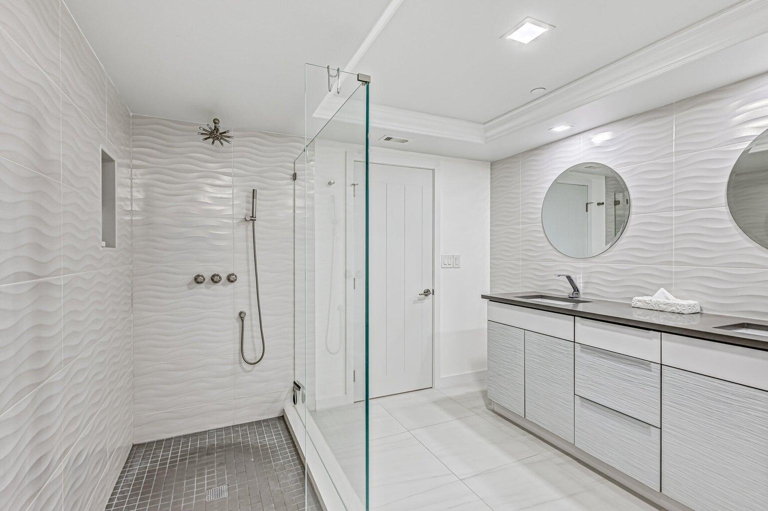 5280 North Ocean Drive, Unit 12F Singer Island, FL 33404 - Photo 34 of 66 a bathroom with a sink a toilet and shower