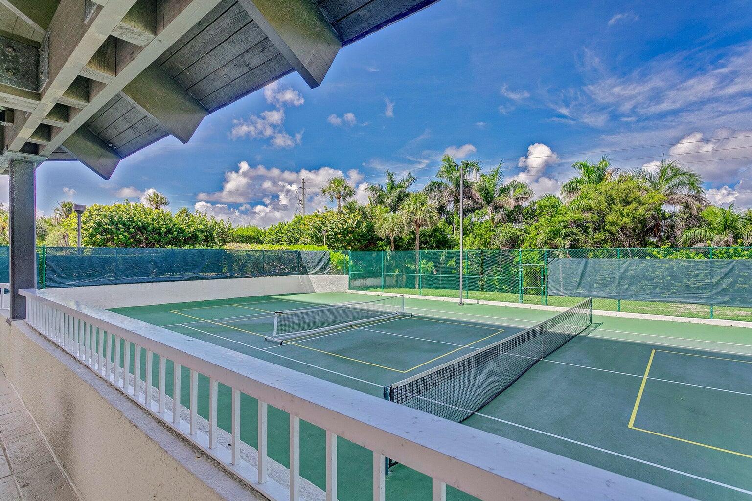 5280 North Ocean Drive, Unit 12F Singer Island, FL 33404 - Photo 49 of 66 a view of a tennis court