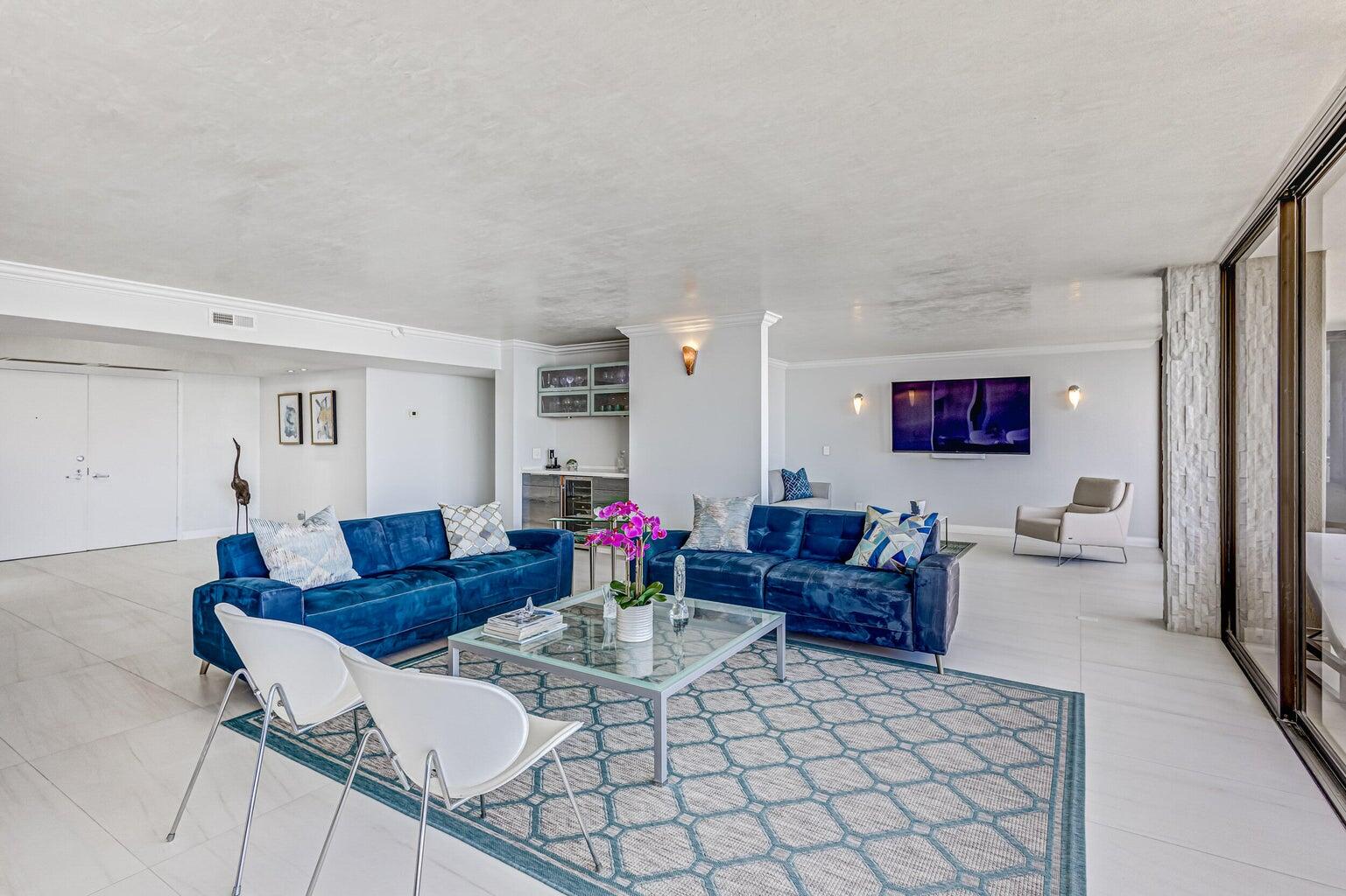 5280 North Ocean Drive, Unit 12F Singer Island, FL 33404 - Photo 5 of 66 a living room with furniture and wooden floor
