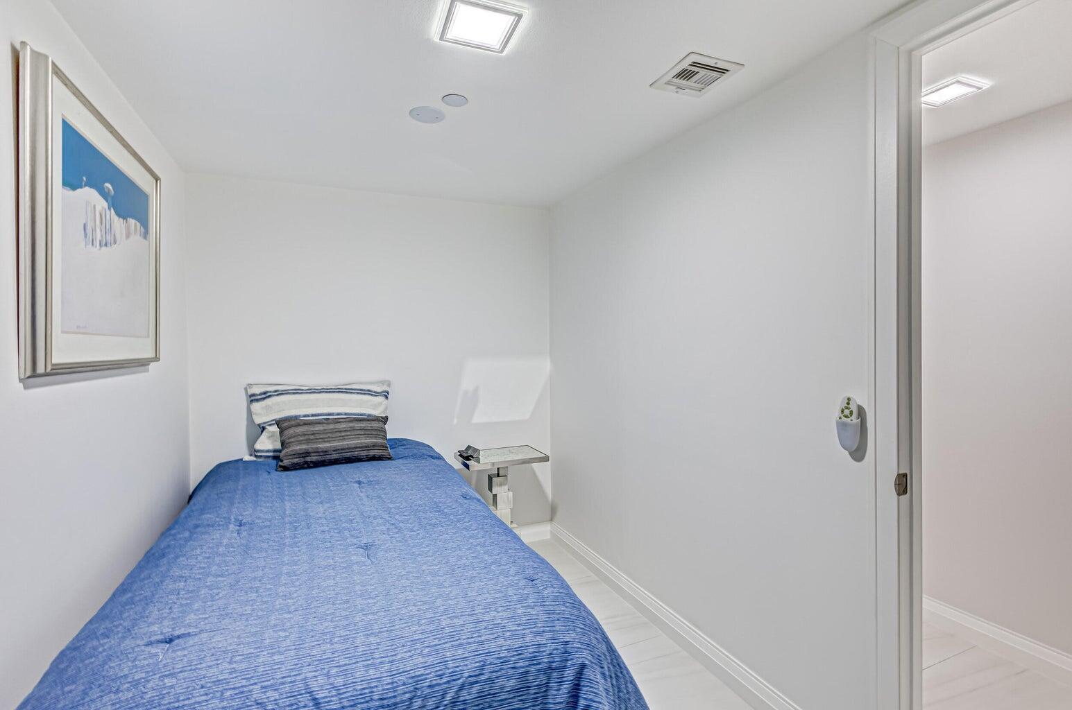 5280 North Ocean Drive, Unit 12F Singer Island, FL 33404 - Photo 55 of 66 a view of a livingroom with wooden floor and furniture