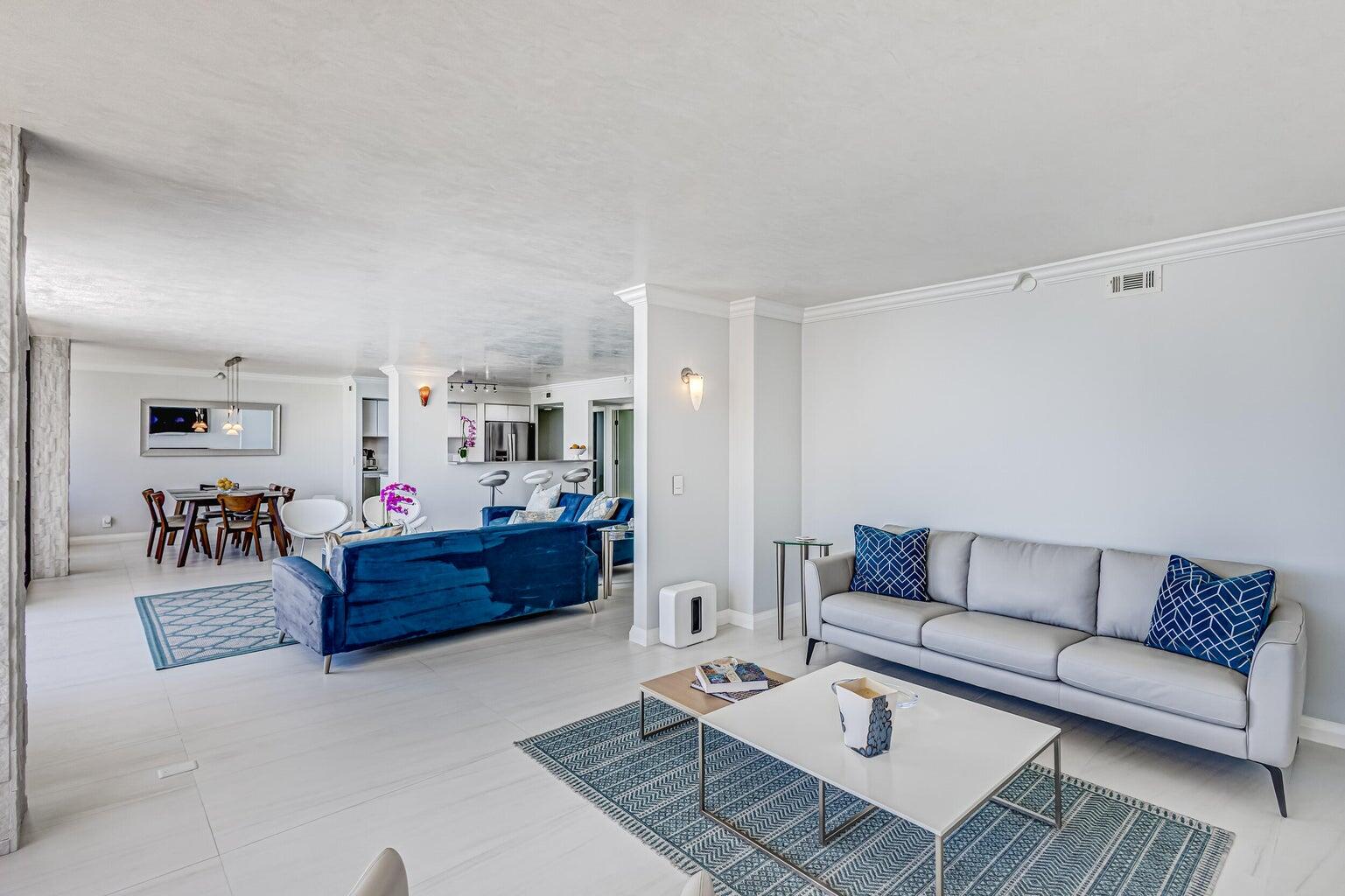 5280 North Ocean Drive, Unit 12F Singer Island, FL 33404 - Photo 10 of 66 a living room with furniture and wooden floor
