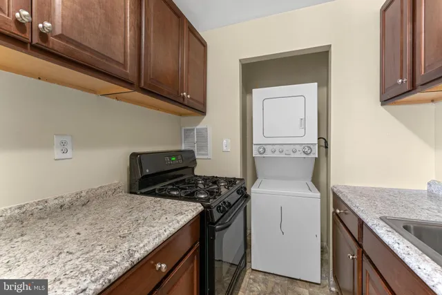 a kitchen with a stove and a microwave