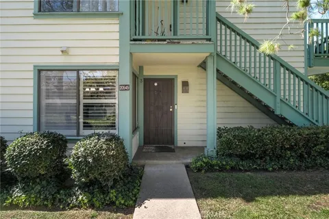 a view of entrance gate of a house