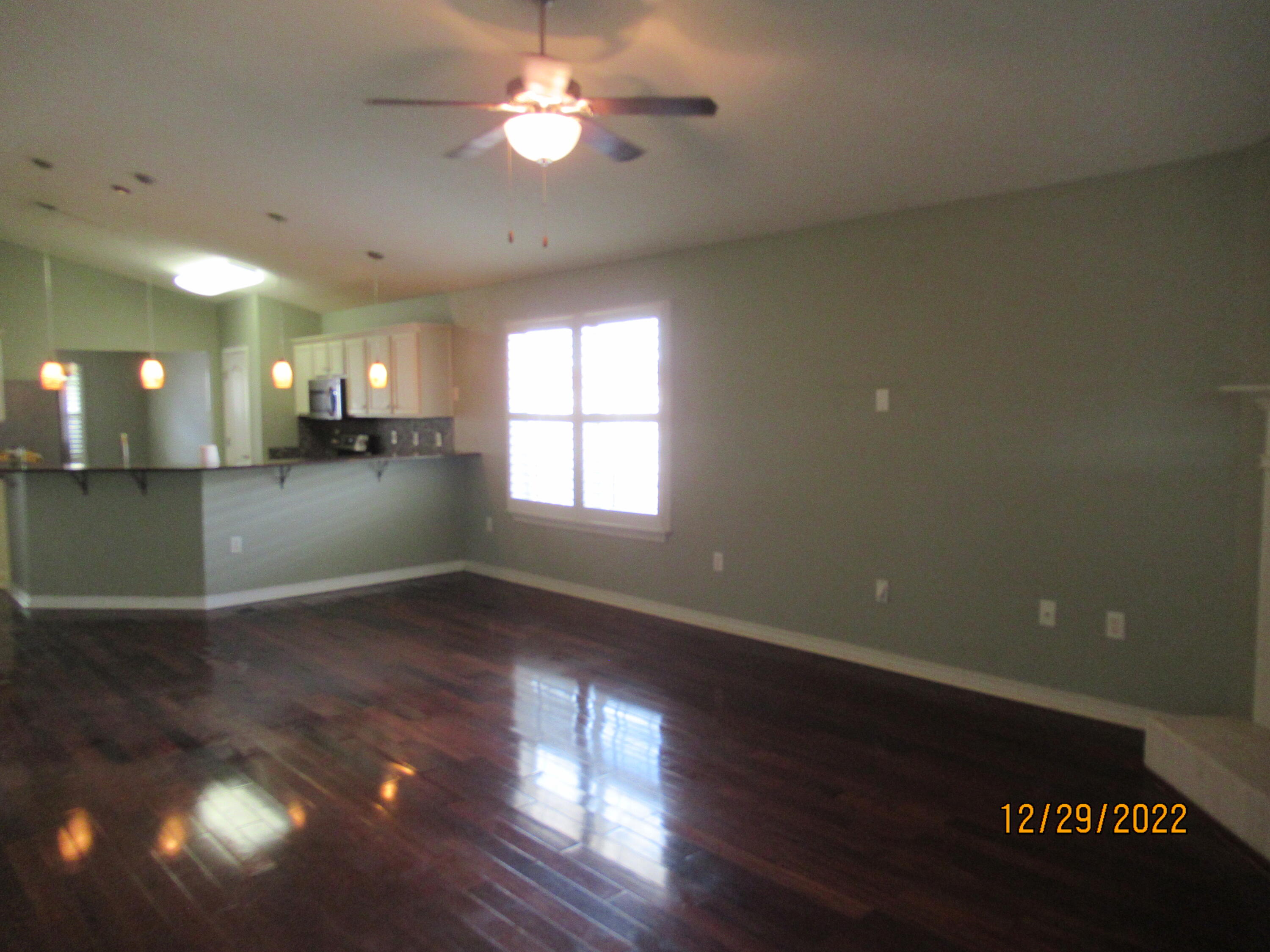 173 South Harborview Road Santa Rosa Beach, FL 32459 - Photo 13 of 24 an empty room with wooden floor and windows