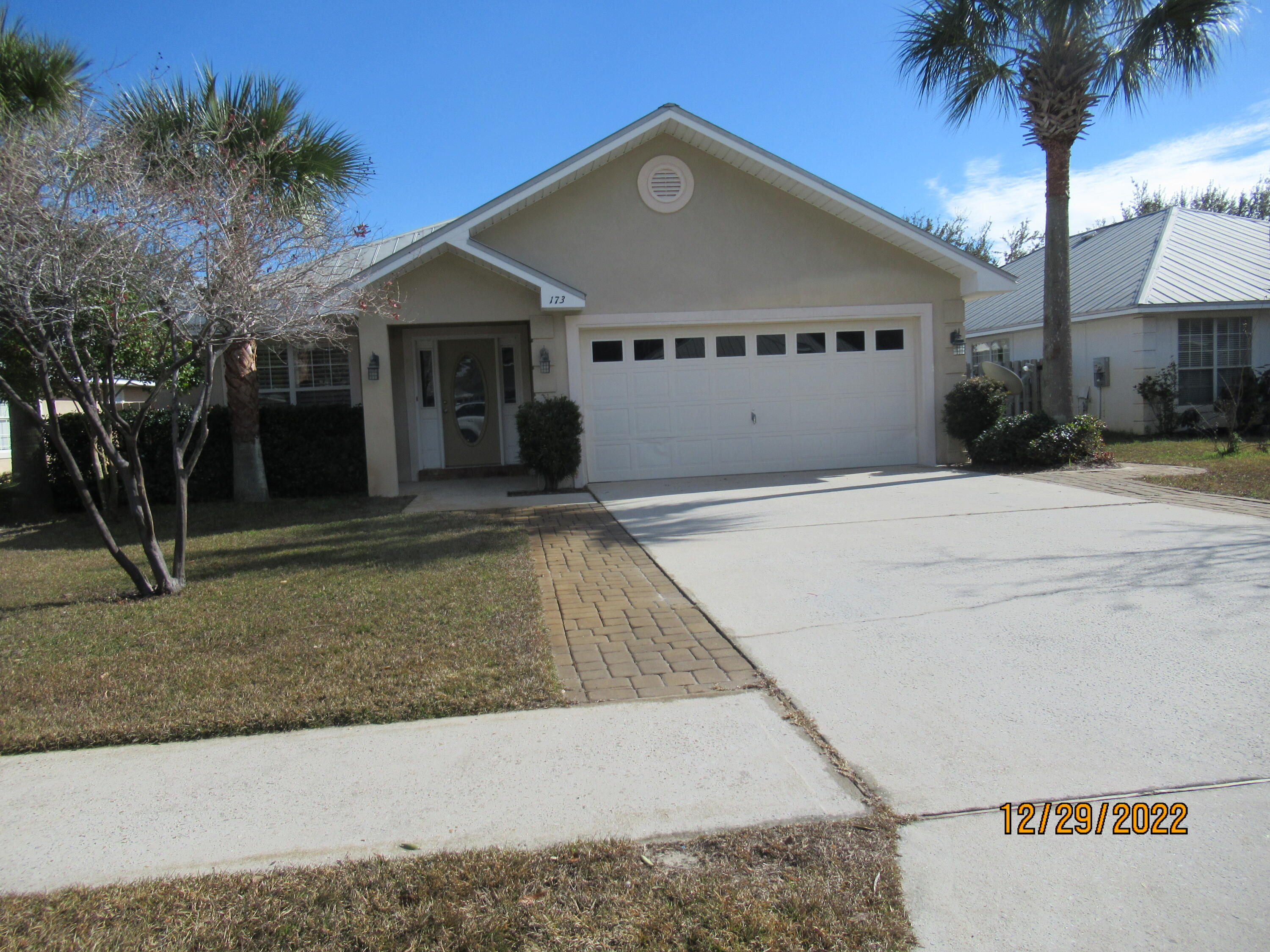 173 South Harborview Road Santa Rosa Beach, FL 32459 - Photo 2 of 24 a view of a house with a patio