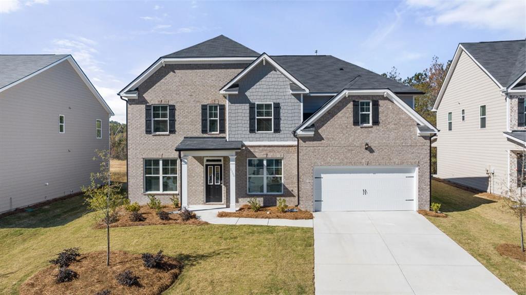 1915 Endress Circle Hampton, GA 30228 - Photo 1 of 42 a front view of a house with swimming pool