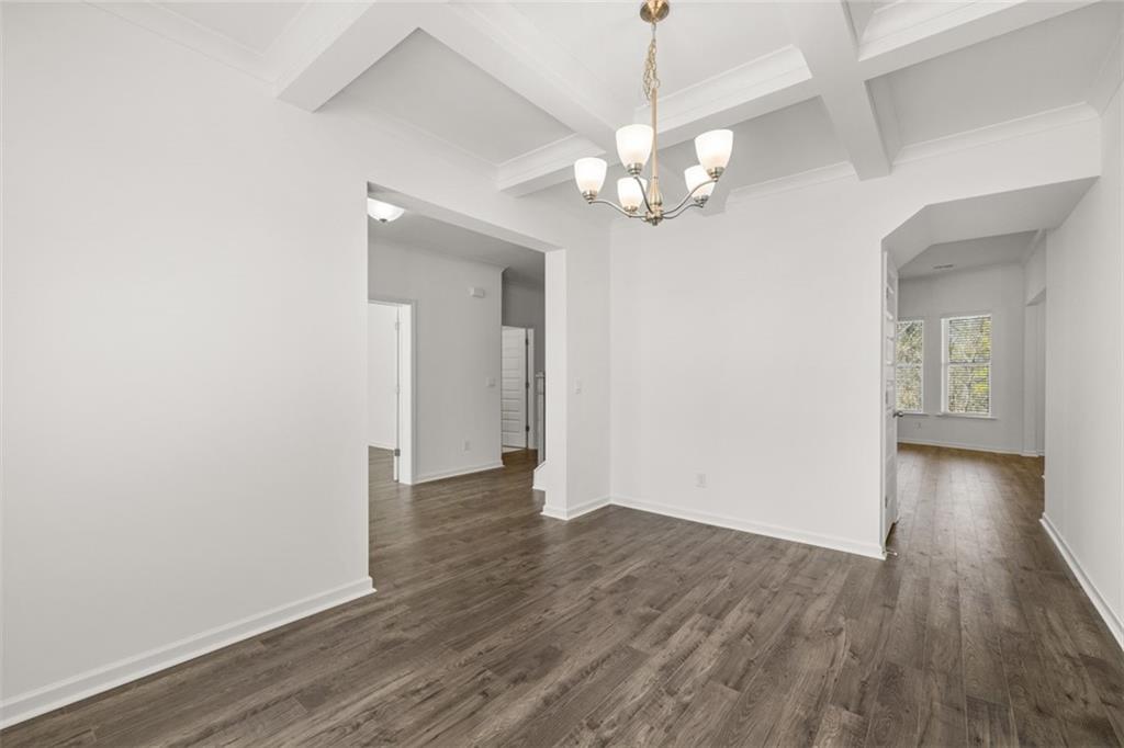1915 Endress Circle Hampton, GA 30228 - Photo 12 of 42 wooden floor in an empty room with a window