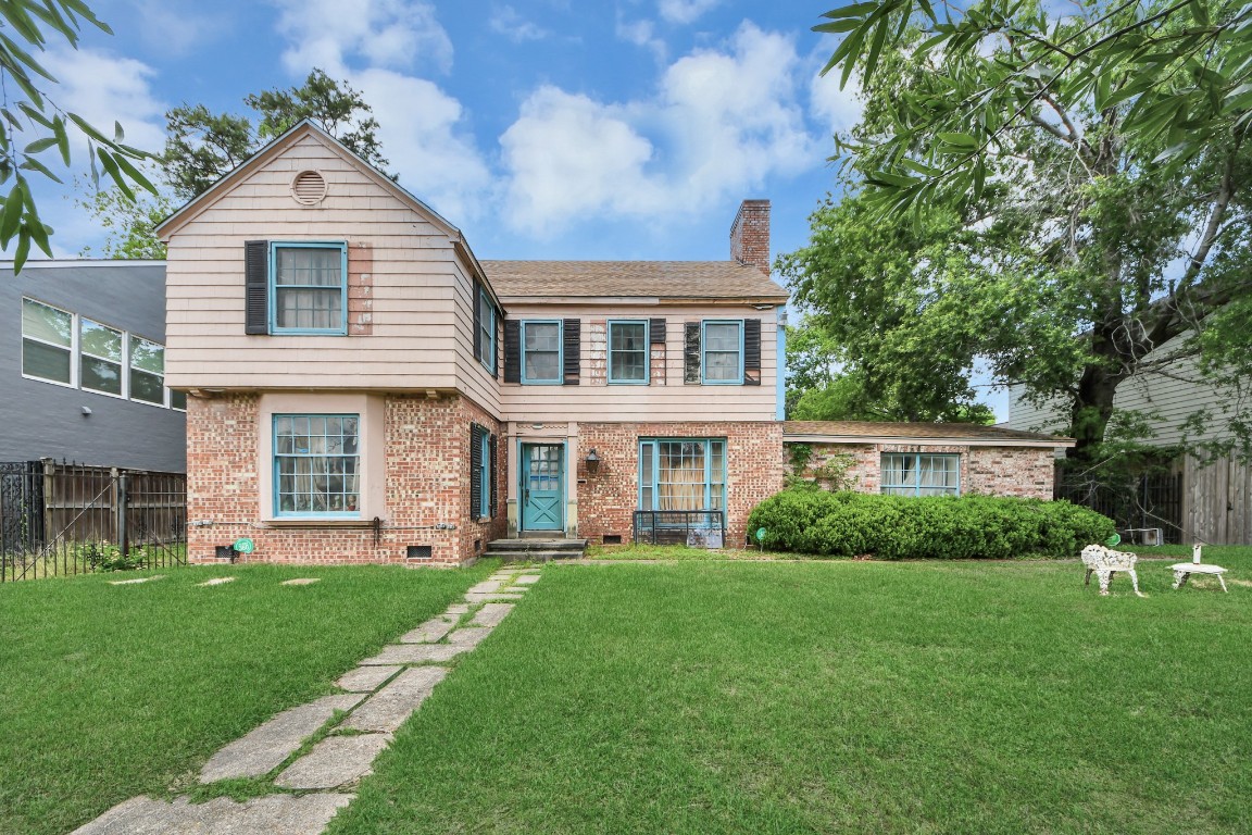 a front of a house with a yard